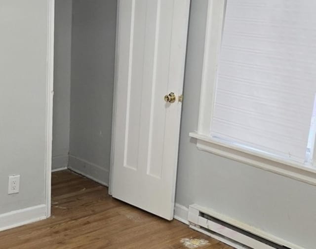 closet featuring baseboard heating