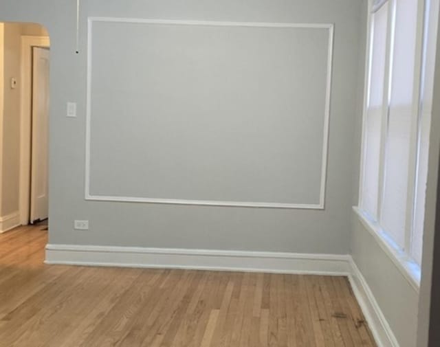 unfurnished room featuring light wood-type flooring