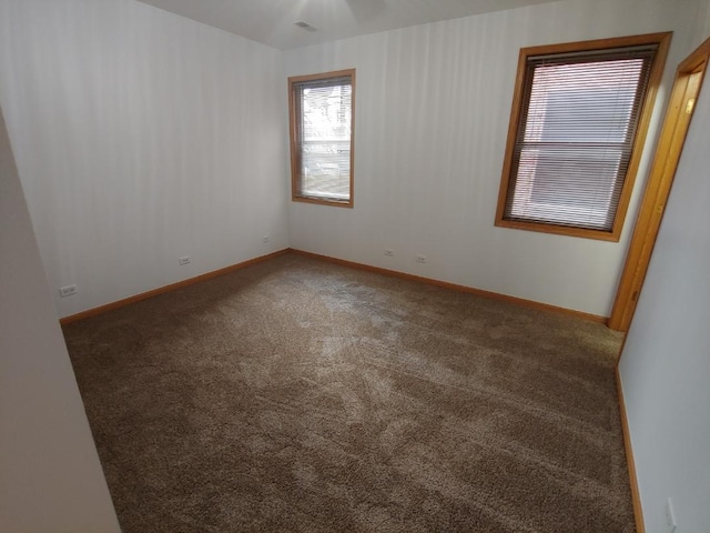 view of carpeted spare room