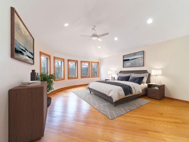 bedroom featuring light wood-type flooring, lofted ceiling, baseboards, and recessed lighting