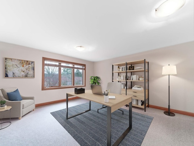 office area featuring carpet and baseboards