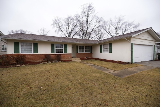 ranch-style home featuring brick siding, an attached garage, driveway, and a front lawn