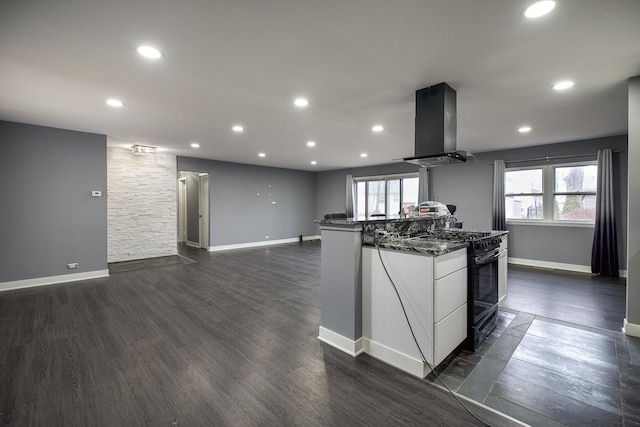 kitchen with dark wood-style floors, a healthy amount of sunlight, island exhaust hood, and black range with gas stovetop