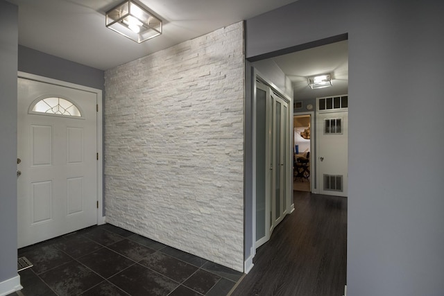 entryway featuring visible vents