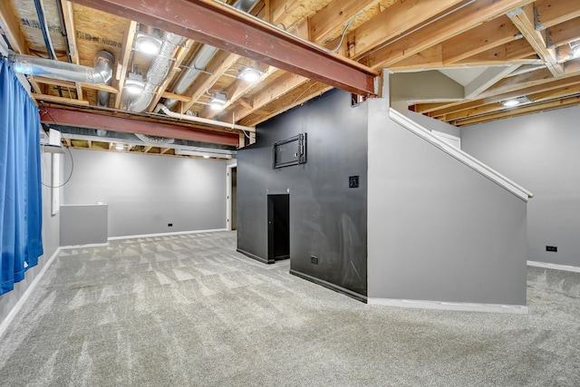 basement featuring carpet flooring