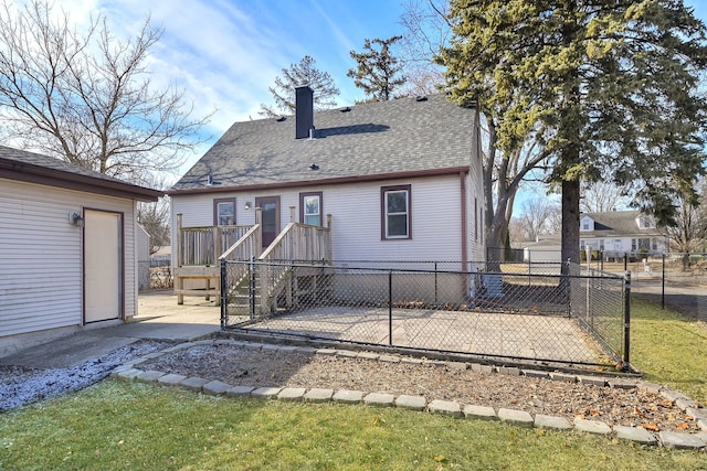 back of property featuring a yard and a patio