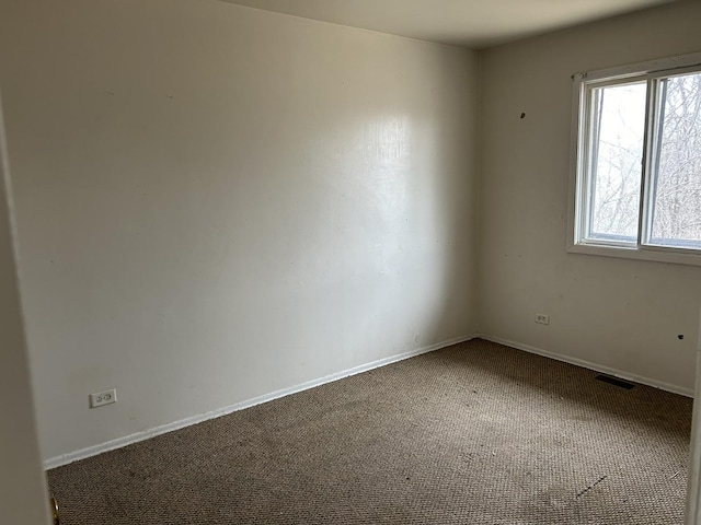 empty room with carpet floors