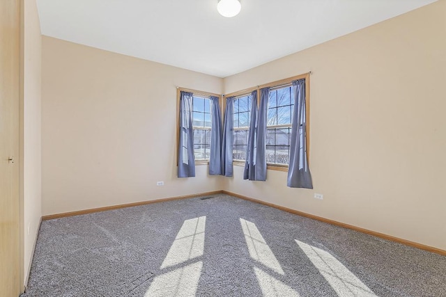 view of carpeted spare room