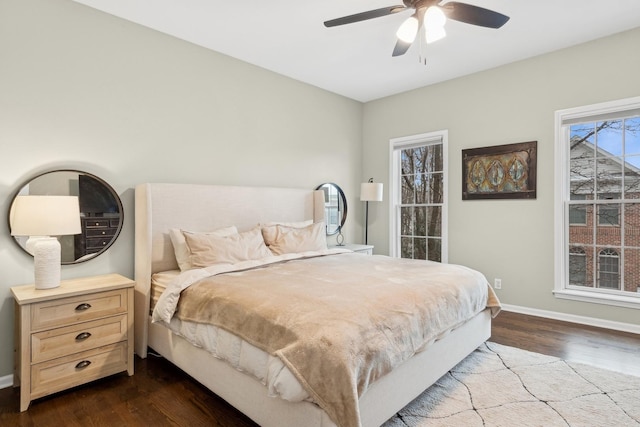 bedroom featuring hardwood / wood-style flooring and ceiling fan