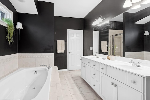 bathroom featuring vanity, tile patterned flooring, and independent shower and bath