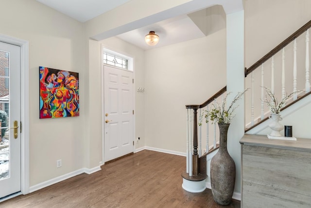 entrance foyer with hardwood / wood-style floors