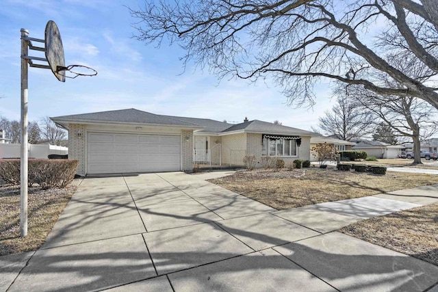 ranch-style house featuring a garage