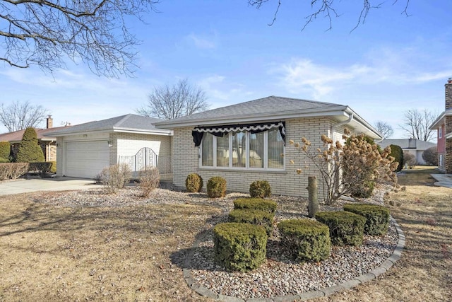 ranch-style home featuring a garage