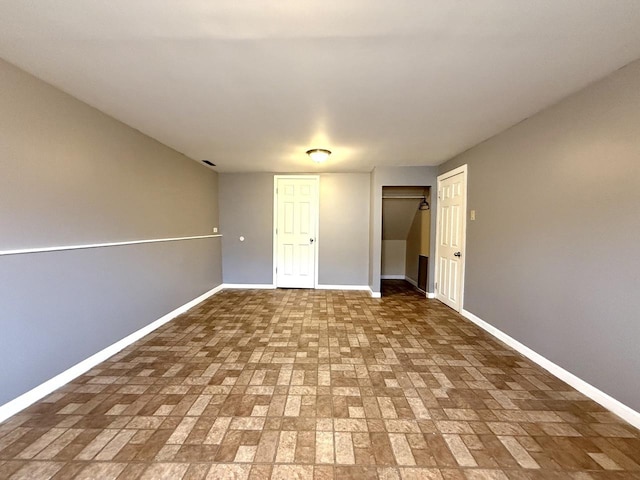 unfurnished bedroom with a closet