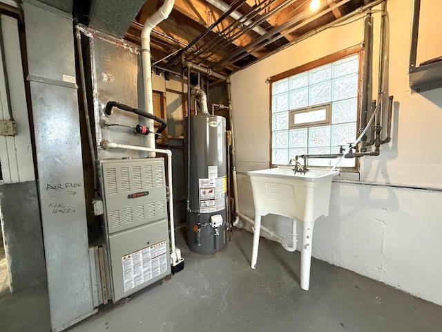 utility room featuring gas water heater