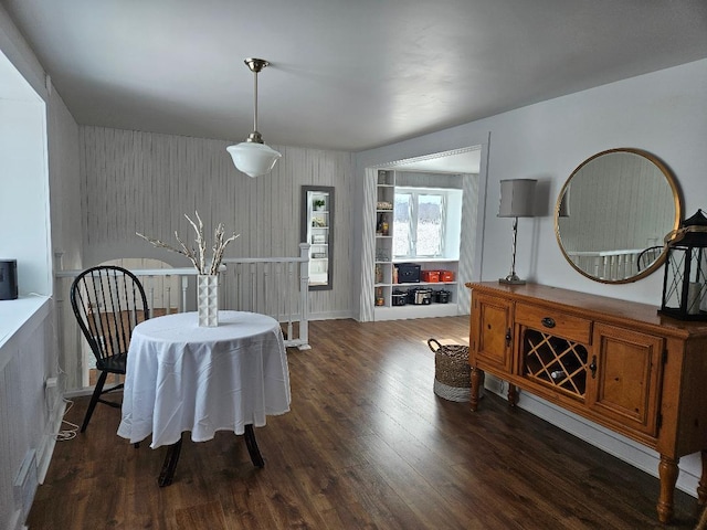 dining room featuring dark hardwood / wood-style flooring