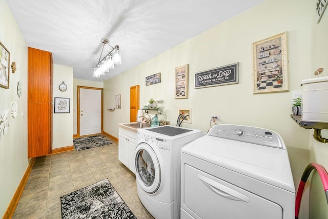 549 Beachview Dr, Lake Holiday, IL 60552 - washroom with washing machine and clothes dryer, cabinet space, a sink, baseboards, and light tile patterned floors