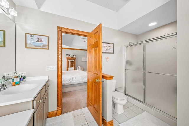549 Beachview Dr, Lake Holiday, IL 60552 - ensuite bathroom with vanity, tile patterned floors, a stall shower, and toilet