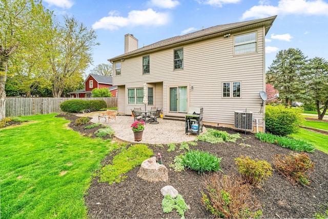 549 Beachview Dr, Lake Holiday, IL 60552 - rear view of property featuring fence, a chimney, a yard, and a patio area