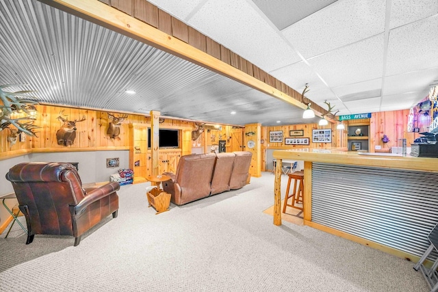 549 Beachview Dr, Lake Holiday, IL 60552 - carpeted living area featuring wooden walls, recessed lighting, and bar area