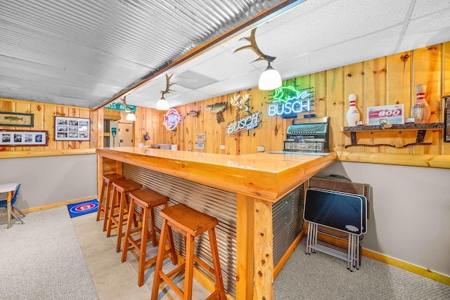 549 Beachview Dr, Lake Holiday, IL 60552 - bar with baseboards, a bar, and wood walls