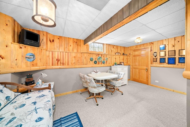 549 Beachview Dr, Lake Holiday, IL 60552 - carpeted dining area featuring baseboards, a drop ceiling, and wood walls