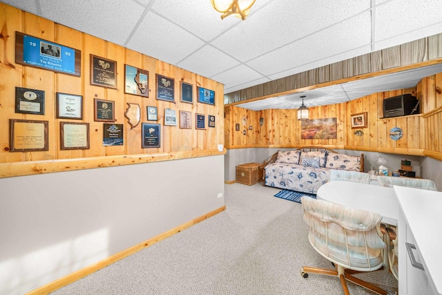 549 Beachview Dr, Lake Holiday, IL 60552 - carpeted living area with baseboards, a drop ceiling, and wood walls