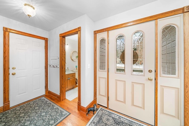 549 Beachview Dr, Lake Holiday, IL 60552 - entryway with baseboards and light wood-style flooring