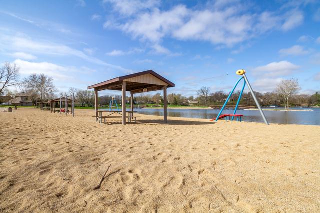 549 Beachview Dr, Lake Holiday, IL 60552 - community jungle gym featuring a water view