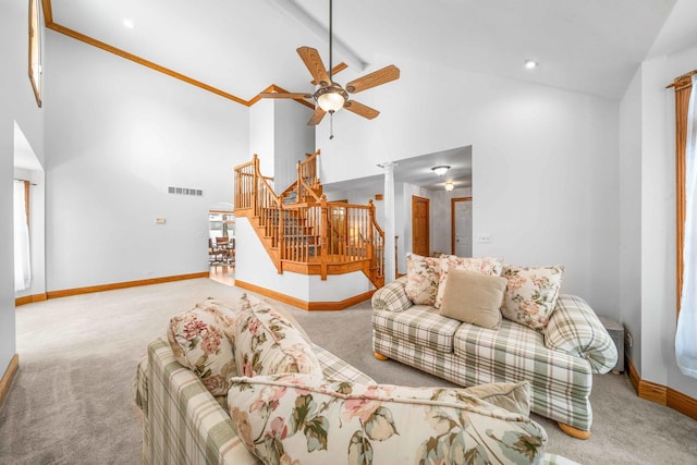 549 Beachview Dr, Lake Holiday, IL 60552 - living area with carpet floors, stairs, baseboards, and high vaulted ceiling