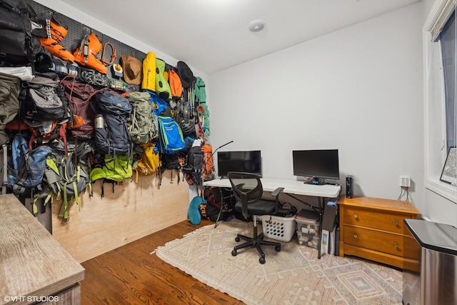 home office with hardwood / wood-style flooring