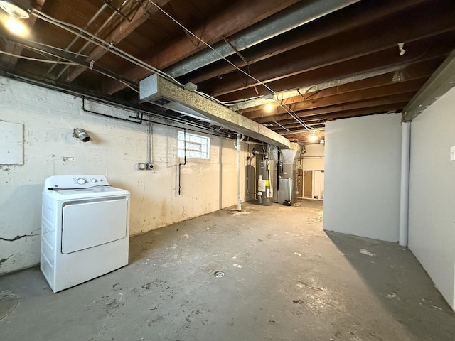 basement with washer / clothes dryer and gas water heater