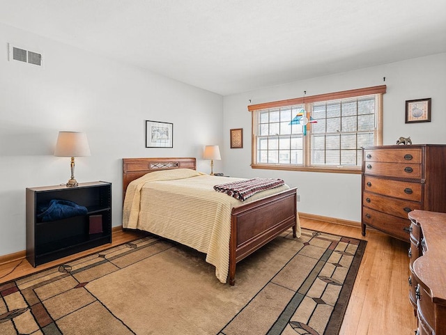 bedroom featuring hardwood / wood-style flooring