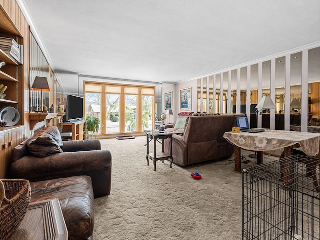 living room with crown molding and carpet floors