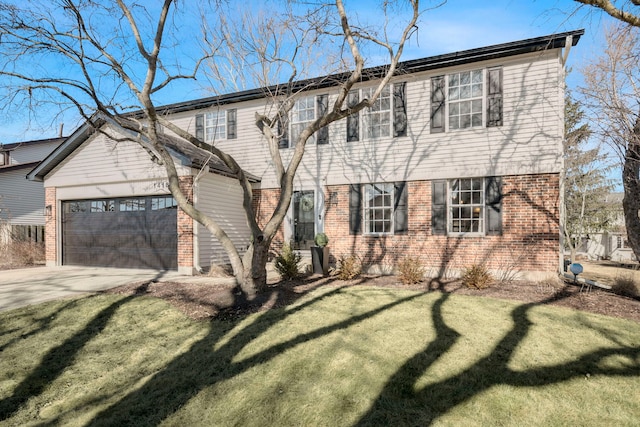 view of front facade with a garage and a front yard