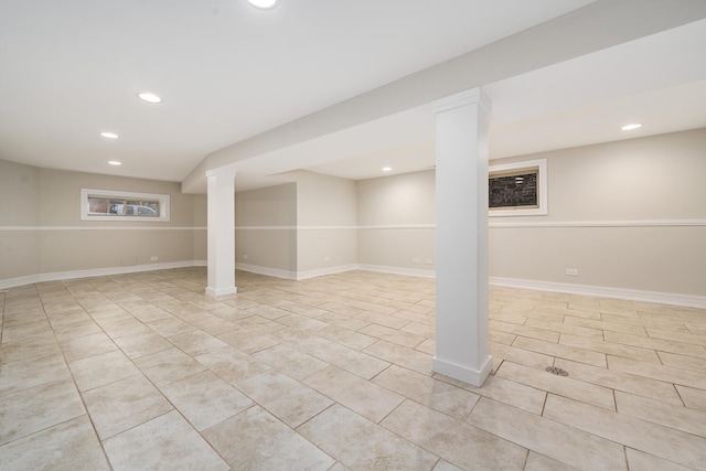 basement with light tile patterned flooring