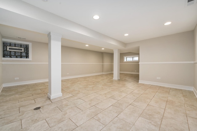 basement with light tile patterned flooring