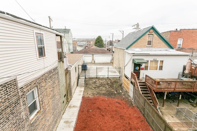 view of yard featuring a fenced backyard and a wooden deck