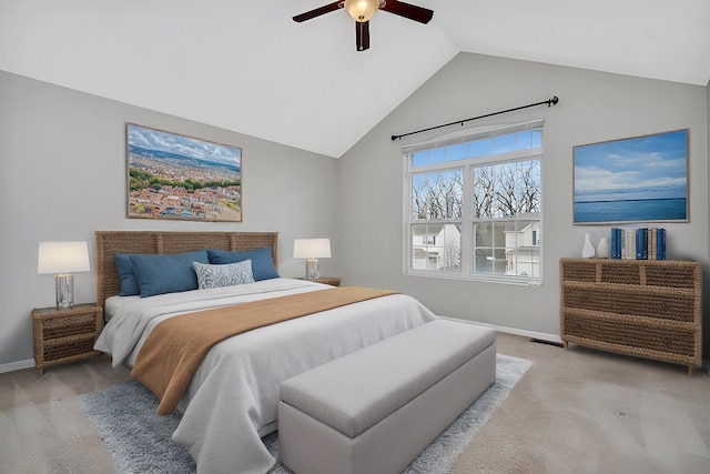 carpeted bedroom with ceiling fan and lofted ceiling