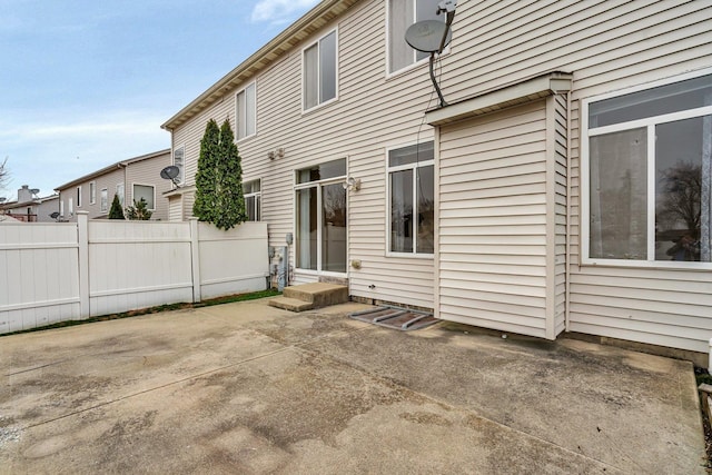 rear view of property with a patio area