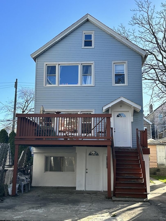 rear view of house with a deck