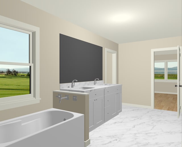 bathroom with vanity and a tub