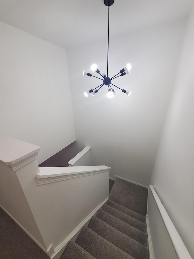 662 W Kristina Ln, Round Lake, IL 60073 - stairway with an inviting chandelier and carpet floors