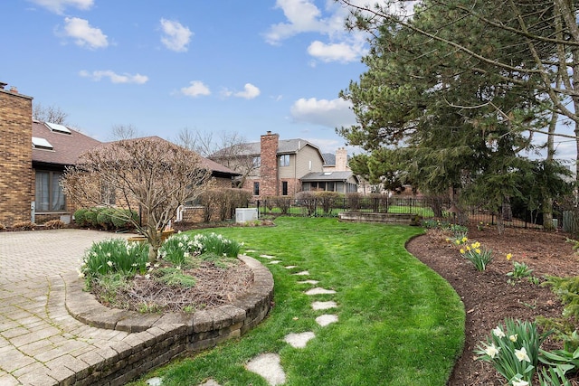 view of yard with a patio area and fence