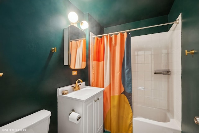 bathroom with shower / bath combo with shower curtain, toilet, and vanity