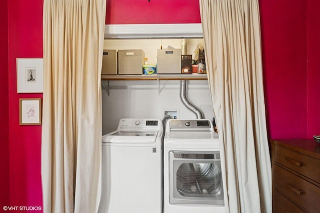 washroom with washer and dryer and laundry area