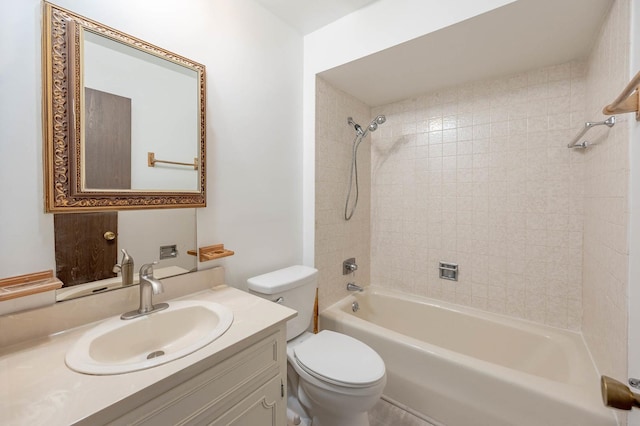 full bathroom featuring vanity, toilet, and tiled shower / bath combo