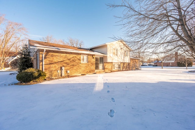 view of snow covered property