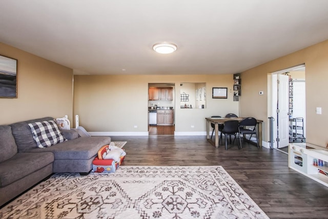 living room with dark hardwood / wood-style floors