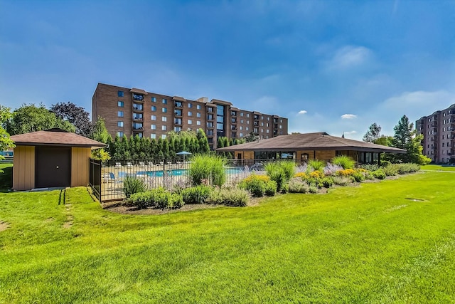 view of yard with a community pool